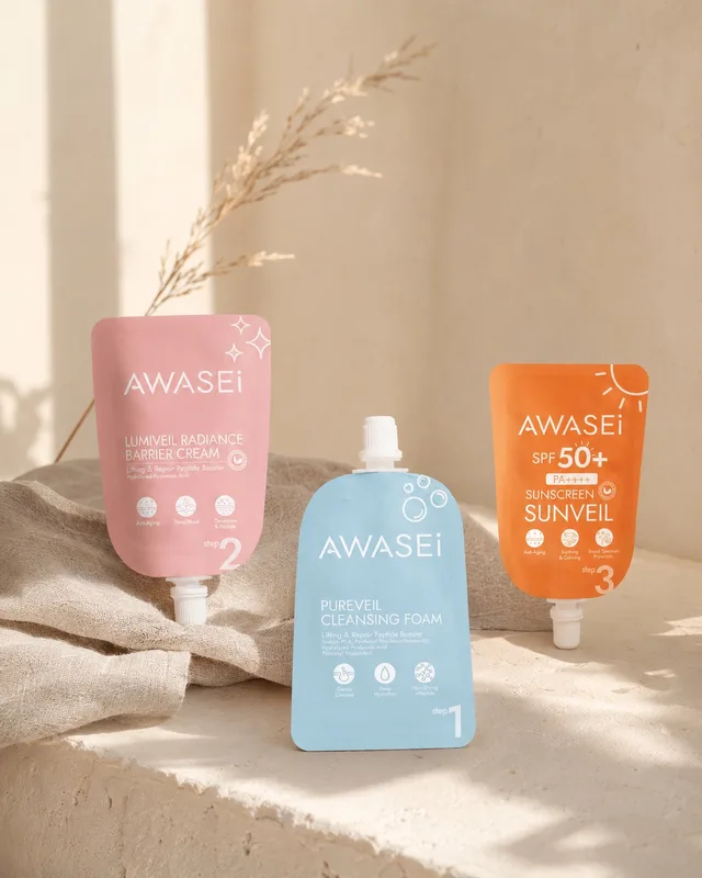 ผลิตภัณฑ์ AWASEi ในบรรจุภัณฑ์สีฟ้า ชมพู และส้ม